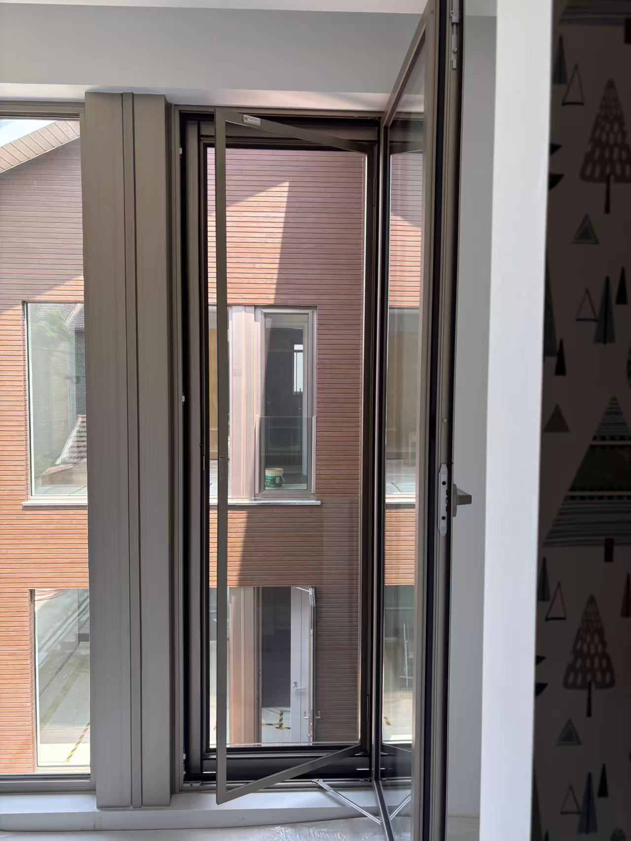 嘉定新江村自建房安裝韋柏小平開金剛網紗門